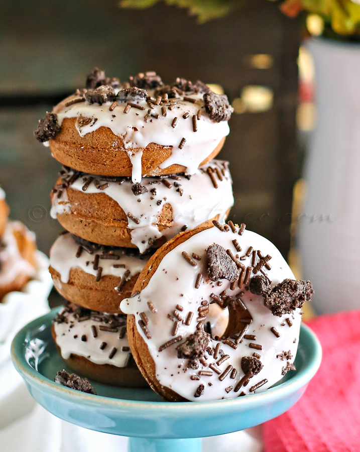 Homemade Donut Recipe - These donuts are made from cake mix and topped with a cream glaze and crumbled Oreo Cookies.
