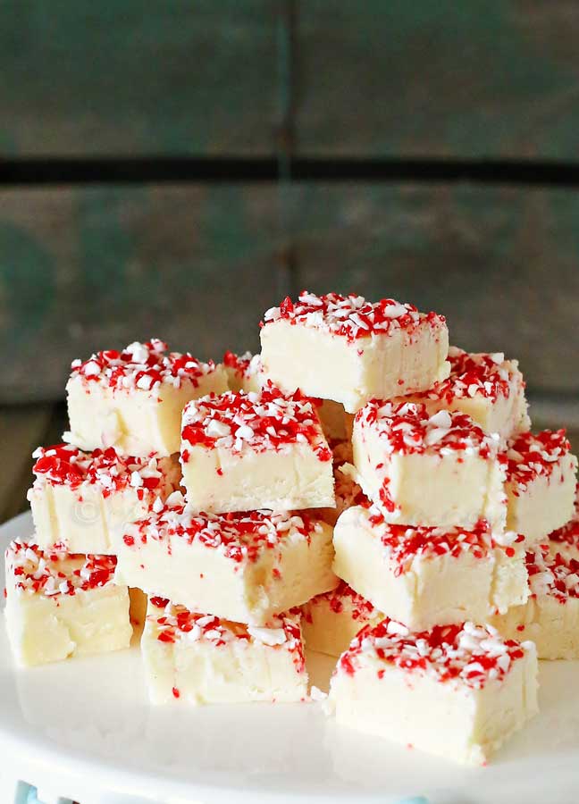 Christmas Recipes - This is a Three Ingredient Recipe! Make this Candy Cane Fudge Recipe for your Christmas Parties, neighbor gifts, or simply share it with your family and friends. Such an easy recipe and super delicious! PIN IT NOW and make it later!