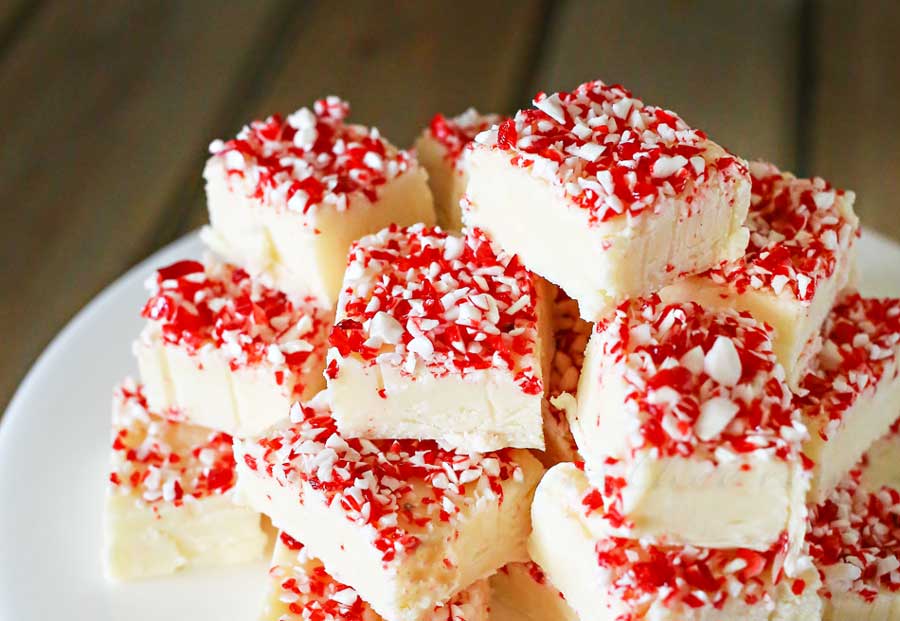 Christmas Recipes - This is a Three Ingredient Recipe! Make this Candy Cane Fudge Recipe for your Christmas Parties, neighbor gifts, or simply share it with your family and friends. Such an easy recipe and super delicious! PIN IT NOW and make it later!