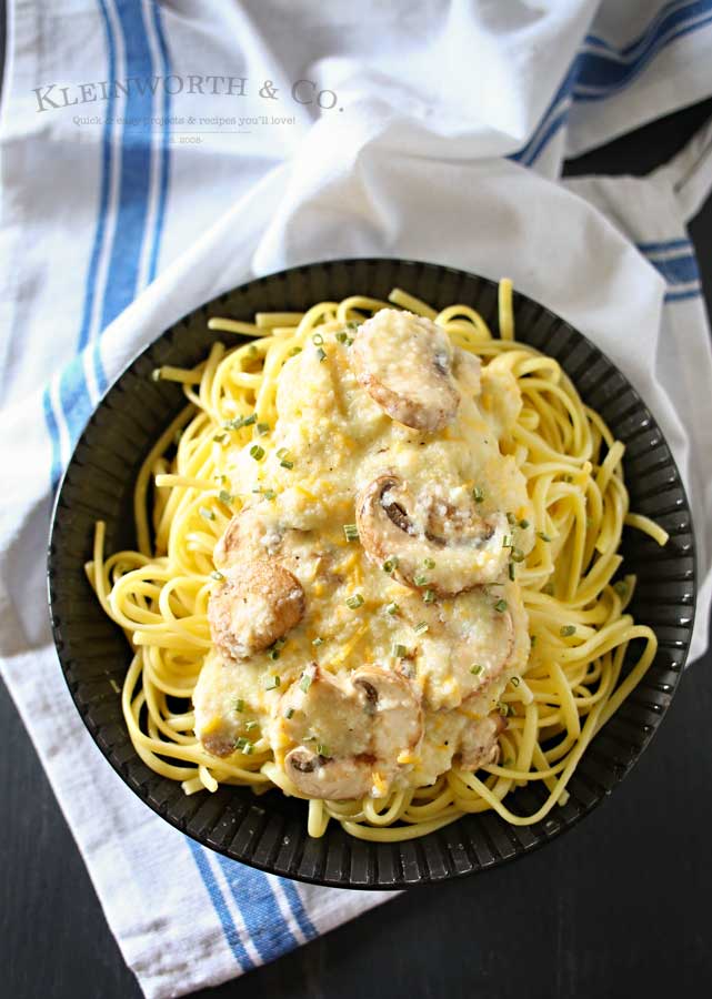 Easy family dinner ideas got better with creamy cauliflower & leek sauce, buttery garlic mushrooms & cheddar cheese on linguine to make Cheddar Mushroom Linguine.