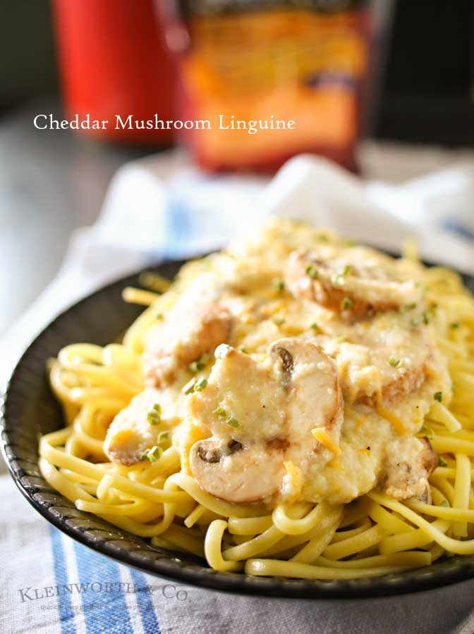 Easy family dinner ideas got better with creamy cauliflower & leek sauce, buttery garlic mushrooms & cheddar cheese on linguine to make Cheddar Mushroom Linguine.