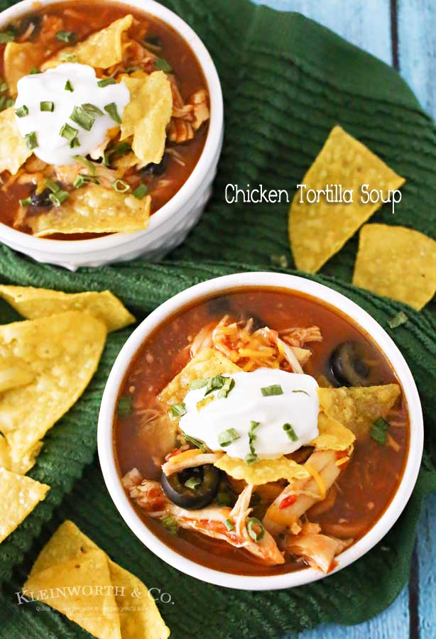 Slow Cooker Chicken Tortilla Soup is loaded with chicken, tomatoes, corn, black beans & olives in a delicious salsa verde base. Simple, hearty & DELICIOUS