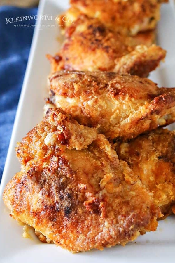 Simplify your dinner with this Oven Fried Chicken that comes out crispy & delicious in about an hour. Less mess & clean up, the best baked chicken recipe. Ever!