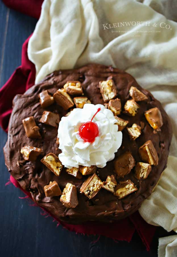 Snickers Brownie for 2, the perfect Valentine's Day treat. Thin brownie layer loaded with Snickers bar pieces & topped with whipped cream and cherry! YUM!