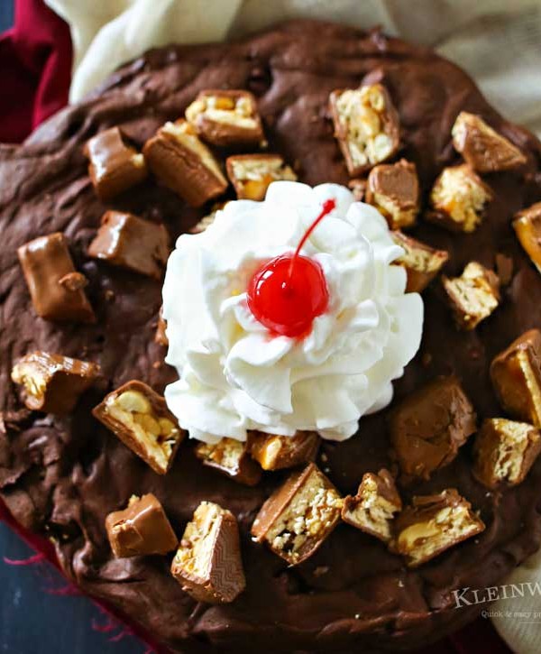 Snickers Brownie for 2, the perfect Valentine's Day treat. Thin brownie layer loaded with Snickers bar pieces & topped with whipped cream and cherry! YUM!