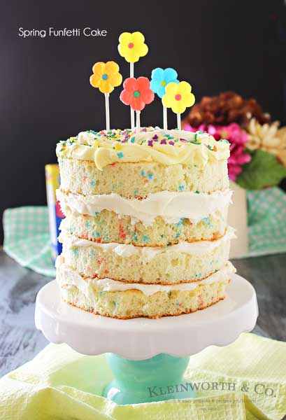 Spring celebrations are fun & easy with this Spring Funfetti Cake. You can create fun family moments with this cake recipe as one of your Easter desserts. Using frosting just in-between layers for that "naked cake" look that is SO popular right now. It's gives the perfect amount of cake to frosting ratio & it's absolutely delicious! I'm loving it for all our holiday & spring birthday celebrations.