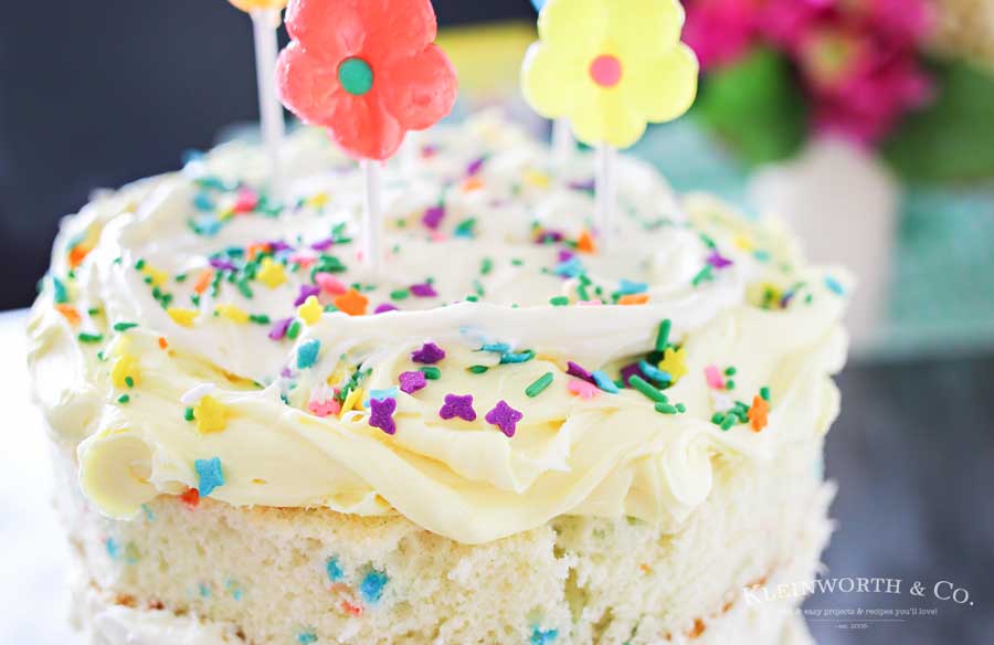 Spring celebrations are fun & easy with this Spring Funfetti® Cake. You can create fun family moments with this cake recipe as one of your Easter desserts. Using frosting just in-between layers for that "naked cake" look that is SO popular right now. It's gives the perfect amount of cake to frosting ratio & it's absolutely delicious! I'm loving it for all our holiday & spring birthday celebrations.