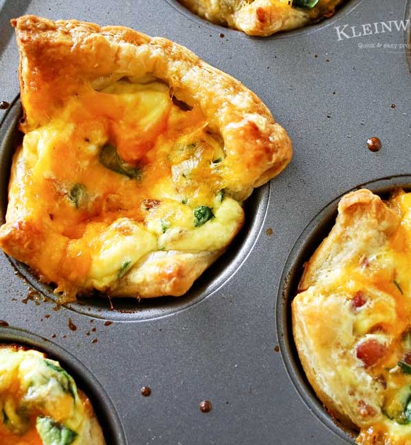 Bacon Cheddar & Spinach Quiche Cups are a perfect, savory brunch recipe that's so easy to make. Baked in fluffy puff pastry- these mini quiches are delish! Perfect for Easter or Mother's Day celebrations, you'll want to make 3-4 batches to feed your crowd. But don't worry, they are so simple & take less than 30 minutes.