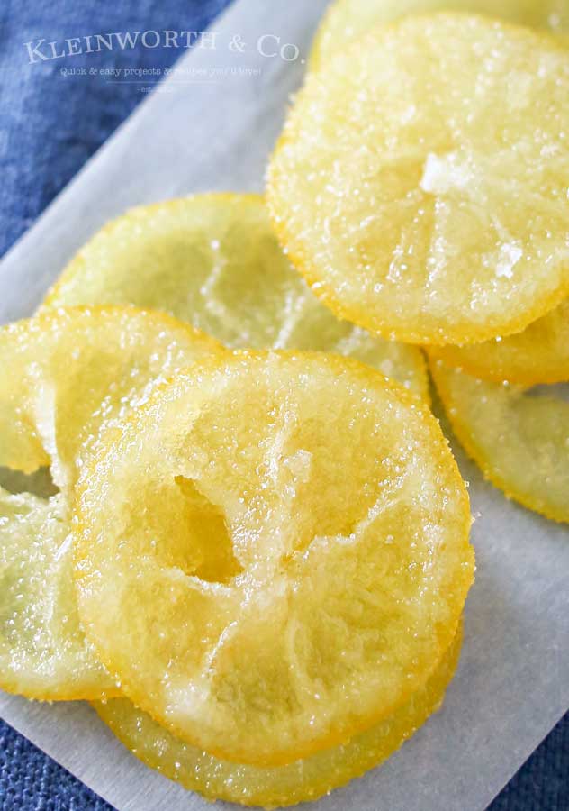Beautiful Candied Lemon Slices are perfect for topping on pastries, cupcakes, drinks & more spring treats! Easy recipe & a great way to use those lemons. Plus you can use all the leftover lemon simple syrup to add to all your favorite drinks later. Don't miss how I use it as the key ingredient in my most popular recipe here on Kleinworth & Co.