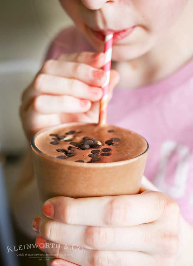 Chocolate milk, peanut butter & bananas come together to make this Chocolate Banana Shake that is the perfect breakfast or snack recipe! Make one before heading out the door or as an after school treat. Either way, everyone loves this chocolate goodness!
