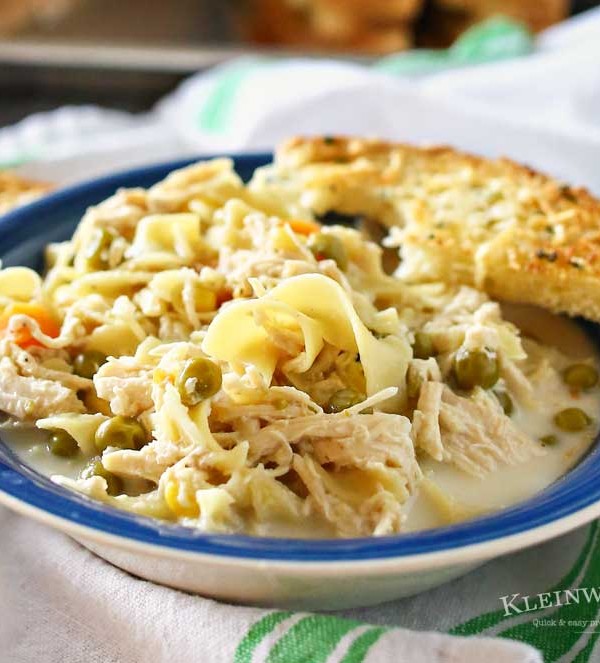 Easy family dinner ideas like this simple crock pot Creamy Chicken Noodle Soup quickly becomes a dinner time favorite. Just toss it all in the slow cooker & dinner is done with little effort. But oh man is it delicious! Absolutely the perfect easy chicken recipe! Don't miss my tips for speeding up the prep process too!