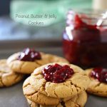 Peanut Butter & Jelly Cookies are a soft & chewy peanut butter cookie recipe topped with a dollop of blackberry preserves. Even better when you make your own jam to add on top. Easy dessert & a PB&J lovers dream! Don't miss my favorite jam recipes I share at the end too. So good!