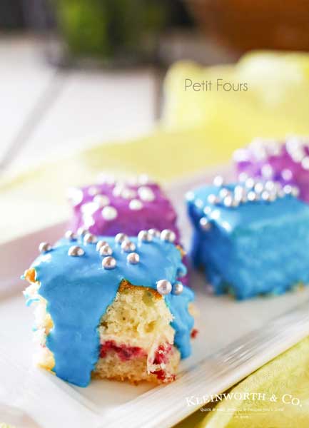 Scrumptious Petit Fours Recipe makes a perfect dessert for any celebration. Light & fluffy cake layered with jam & frosting & coated with more frosting! A favorite cake recipe that really shows it's something special. Serve these Spring Petit Fours. They are definitely the cutest little dessert and everyone will be amazed that they are homemade!