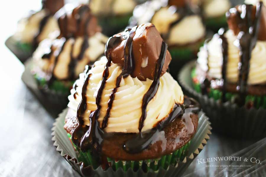 Snickers Overload Cupcakes are simple 3 ingredient chocolate cupcakes stuffed & topped with Snickers bars. Add the easy to make frosting & you are good to go. So good! OMG!!!