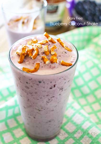 Blueberry Coconut Shake is a dairy-free milkshake made with coconut milk ice cream & frozen blueberries. Simple frozen dessert makes eating healthy easy! This shake is seriously one of the best- you would never know it's dairy free! So good!