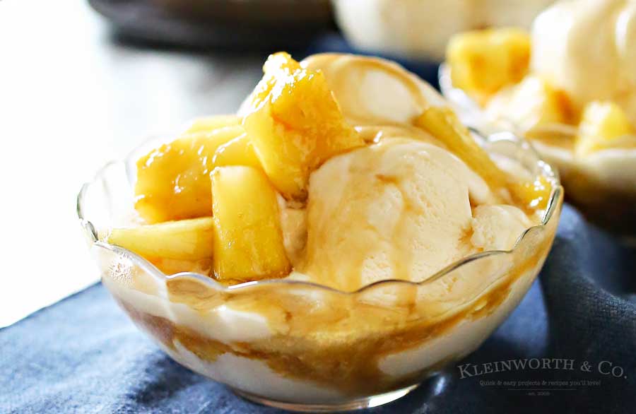 Brown Sugar Pineapple Sundae is a tropical dessert idea that's simple & quick to make. Pineapple coated in brown sugar glaze on top of ice cream, yum! It's the perfect refreshing frozen dessert idea.