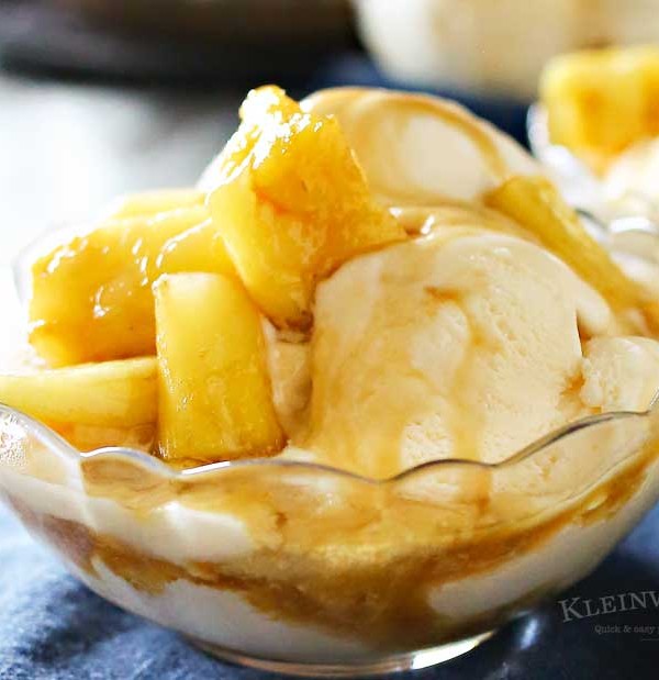 Brown Sugar Pineapple Sundae is a tropical dessert idea that's simple & quick to make. Pineapple coated in brown sugar glaze on top of ice cream, yum! It's the perfect refreshing frozen dessert idea.