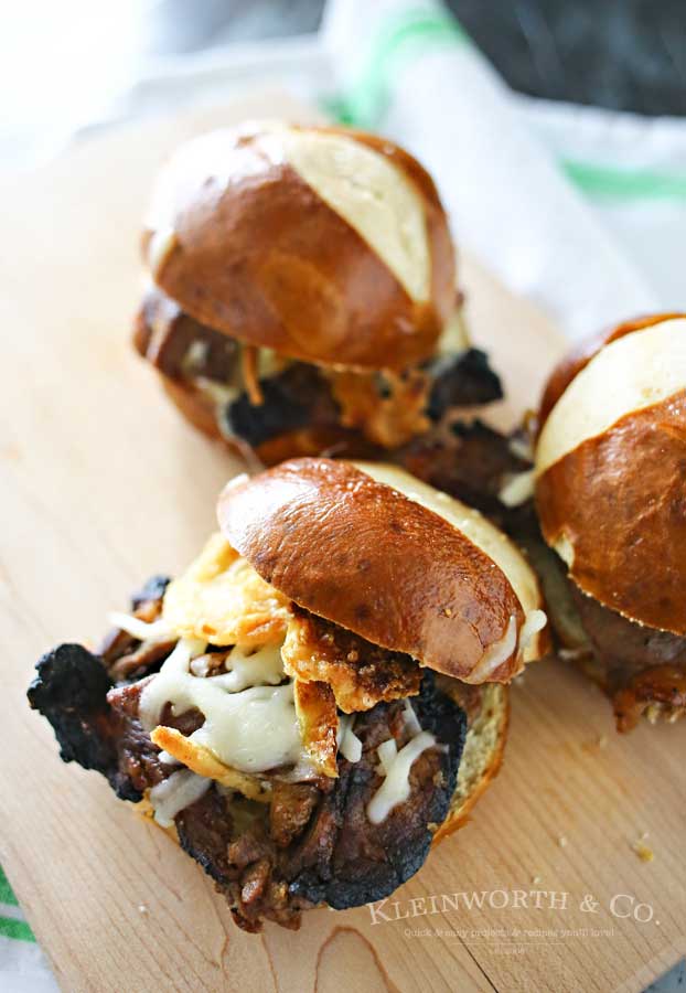 Carne Asada Sliders are a great easy family dinner idea that's perfect for warm weather holidays. The perfect grilled beef sandwich recipe for summer. Loaded with all the good stuff- everyone will RAVE!