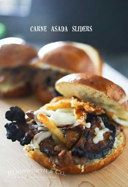 Carne Asada Sliders are a great easy family dinner idea that's perfect for warm weather holidays. The perfect grilled beef sandwich recipe for summer. Loaded with all the good stuff- everyone will RAVE!