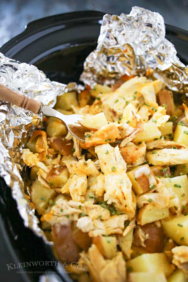 Cheesy Chicken Ranch Potatoes are a simple slow cooker side dish recipe that's so delicious. Just another easy family dinner idea that's ready in just 4 hours. OMG- these are SO GOOD! LOVE that this recipe is family size & uses rotisserie chicken!