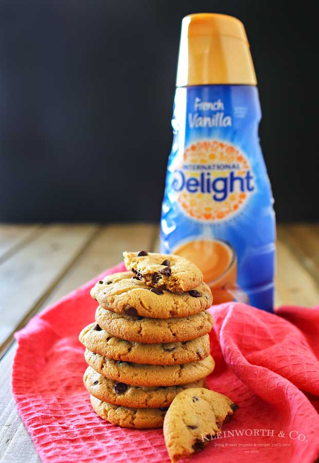 Chocolate Chip Peanut Butter Cookies are crisp outside, soft inside. There's also a secret ingredient that makes them the BEST peanut butter cookies ever! Oh & the fact that they are loaded with mini chocolate chips doesn't hurt either!