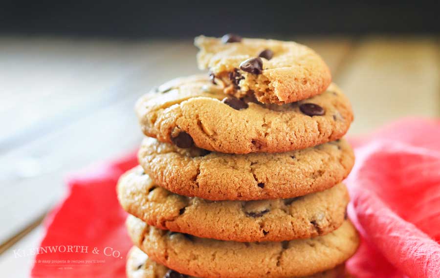 Chocolate Chip Peanut Butter Cookies are crisp outside, soft inside. There's also a secret ingredient that makes them the BEST peanut butter cookies ever! Oh & the fact that they are loaded with mini chocolate chips doesn't hurt either!