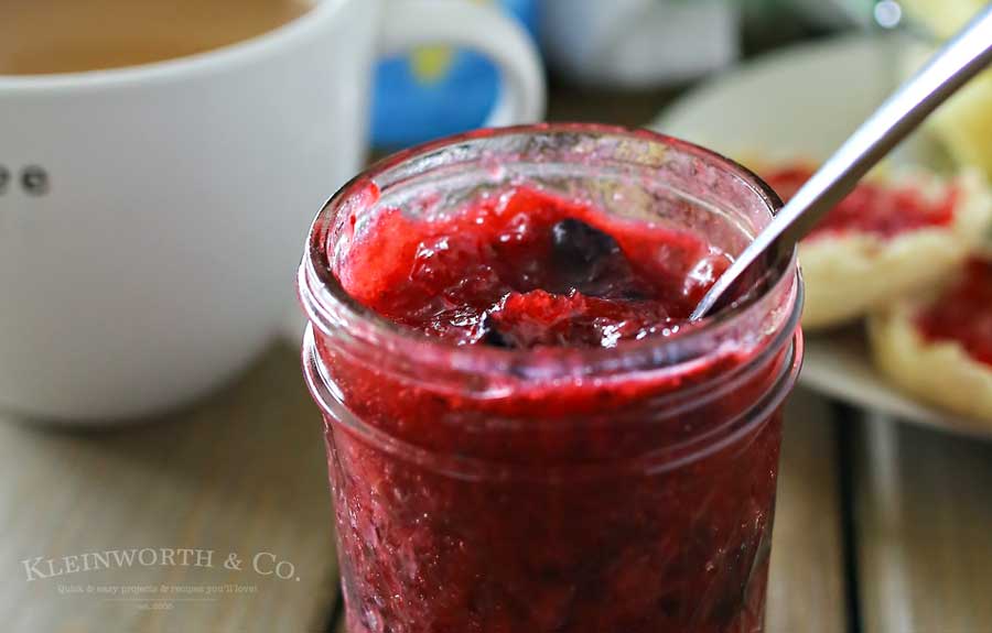 Double Berry Freezer Jam is a simple homemade preserves recipe that takes just about 10 minutes. Perfect for all that summer fruit from the garden! It's great with breakfast or paired with your peanut butter. I even like to add some to my ice cream!