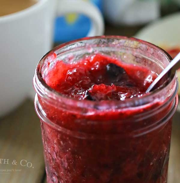 Double Berry Freezer Jam is a simple homemade preserves recipe that takes just about 10 minutes. Perfect for all that summer fruit from the garden! It's great with breakfast or paired with your peanut butter. I even like to add some to my ice cream!