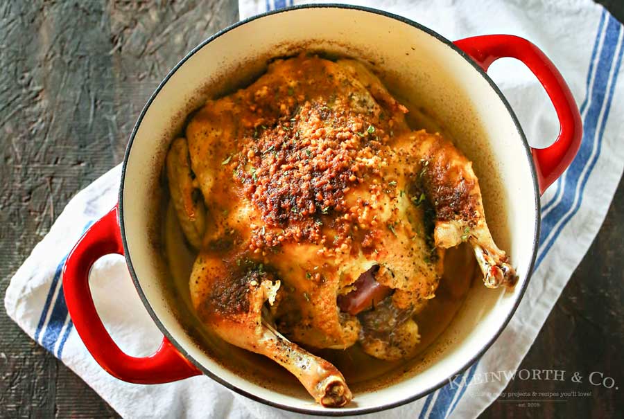Dutch Oven Garlic Chicken is a simple chicken dinner recipe that takes just a few minutes of prep & a couple hours to cook. Easy family dinner ideas like roasted chicken are great! I love how simple it is!