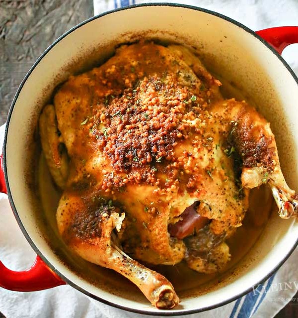 Dutch Oven Garlic Chicken is a simple chicken dinner recipe that takes just a few minutes of prep & a couple hours to cook. Easy family dinner ideas like roasted chicken are great! I love how simple it is!