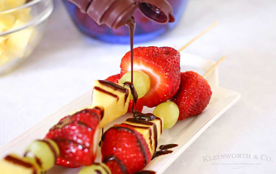 Fruit Kabobs are a simple low calorie dessert idea that makes both kids & adults smile. They are great for parties & backyard BBQ's too! Pick your favorite fruits & create some fabulous combinations.