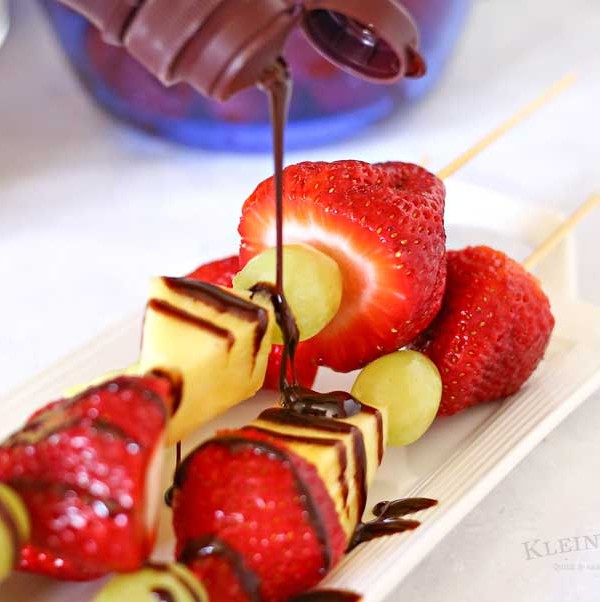 Fruit Kabobs are a simple low calorie dessert idea that makes both kids & adults smile. They are great for parties & backyard BBQ's too! Pick your favorite fruits & create some fabulous combinations.