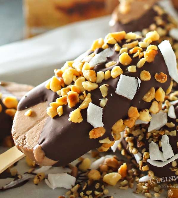 Coconut Nut Ice Cream Bars are the perfect little cool down on a hot summer day. Just a handful of ingredients & a few minutes is all you need. Chocolate ice cream coated with a thick layer of milk chocolate & coated with coconut & macadamia nuts is just heaven.