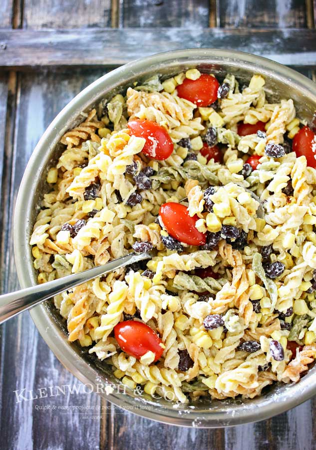 Grilled Corn Pasta Salad is the perfect easy side dish recipe to bring to all your holiday celebrations & backyard BBQ's. Delicious pasta salad for a crowd.