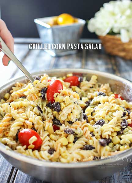 Grilled Corn Pasta Salad is the perfect easy side dish recipe to bring to all your holiday celebrations & backyard BBQ's. Delicious pasta salad for a crowd.