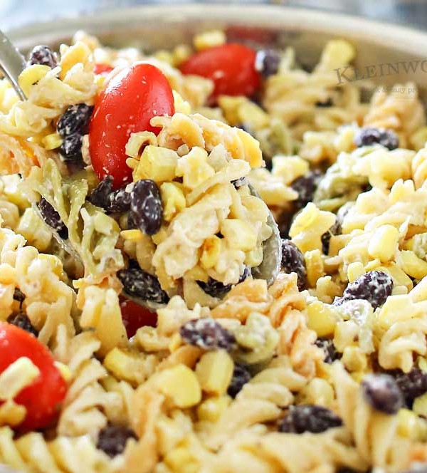 Grilled Corn Pasta Salad is the perfect easy side dish recipe to bring to all your holiday celebrations & backyard BBQ's. Delicious pasta salad for a crowd.