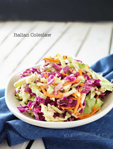 Italian Coleslaw is a twist on the classic backyard bbq side dish. Zesty and flavorful, this coleslaw recipe is sure to be a favorite all summer long.