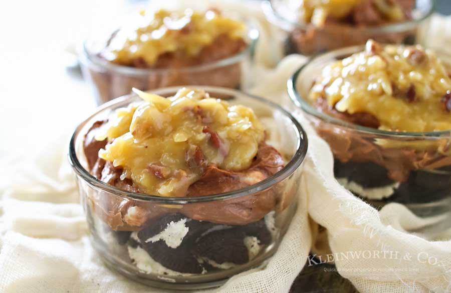 No Bake German Chocolate Cheesecake has an Oreo cookie base, simple no-bake chocolate cheesecake & topped with an easy german chocolate frosting! It's the perfect summer dessert that takes just a few minutes to make! 