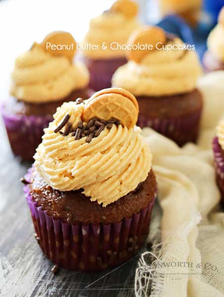 Peanut Butter Chocolate Cupcakes are the perfect cupcake recipe for peanut butter & chocolate lovers. Topped with a peanut butter cookie & sprinkles- Yummy!