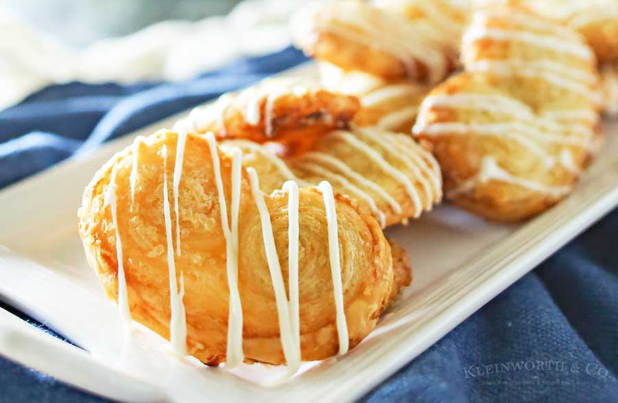 White Chocolate Palmiers are a simple cookie made with puff pastry. Ready in as little as 40 minutes, they make a great addition to summer brunch.