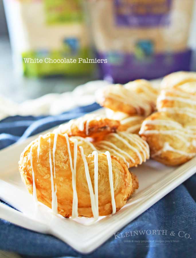 White Chocolate Palmiers are a simple cookie made with puff pastry. Ready in as little as 40 minutes, they make a great addition to summer brunch.