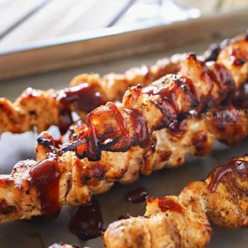 Grilled Chicken Skewers are a fun & easy grilled chicken recipe that's better than you find at the carnival. Seasoned to perfection & oh so delicious!