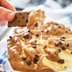 Peanut Butter Brownie Dip is a delicious dessert made of blended peanut butter & brownie batter dips & mini chocolate chips. It's heaven in a bowl.