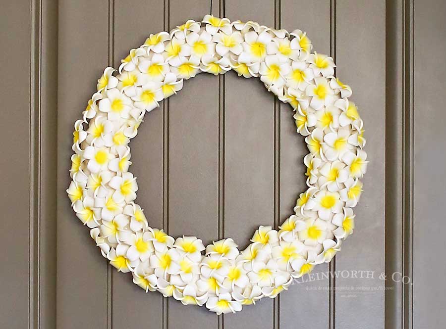 This Plumeria Wreath is the perfect summer front door decoration. Check out my full how-to tutorial on this simple & easy DIY project for the home.