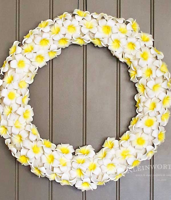 This Plumeria Wreath is the perfect summer front door decoration. Check out my full how-to tutorial on this simple & easy DIY project for the home.