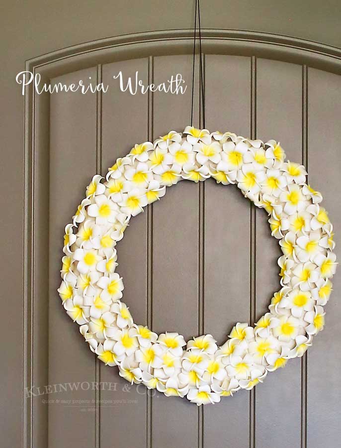 This Plumeria Wreath is the perfect summer front door decoration. Check out my full how-to tutorial on this simple & easy DIY project for the home.