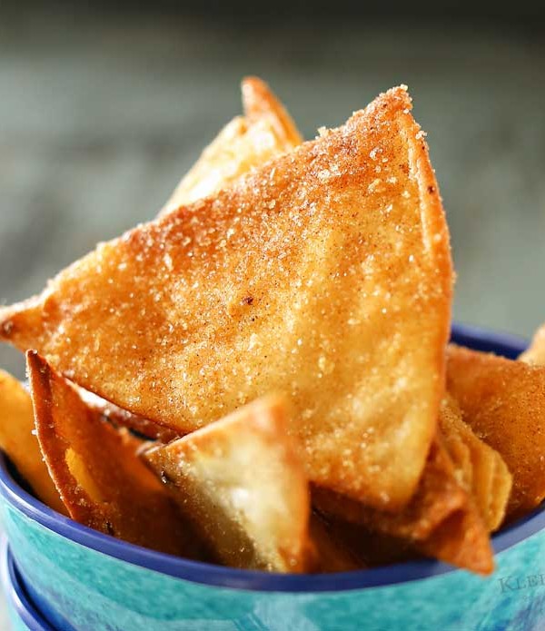 Salted Cinnamon Sugar Chips are easy homemade tortilla chips dusted with delicious cinnamon & sugar & a hint of sea salt. Perfect for dipping in a dessert or dunking in a warm bowl of chocolate sauce. YUUUMMM!!!