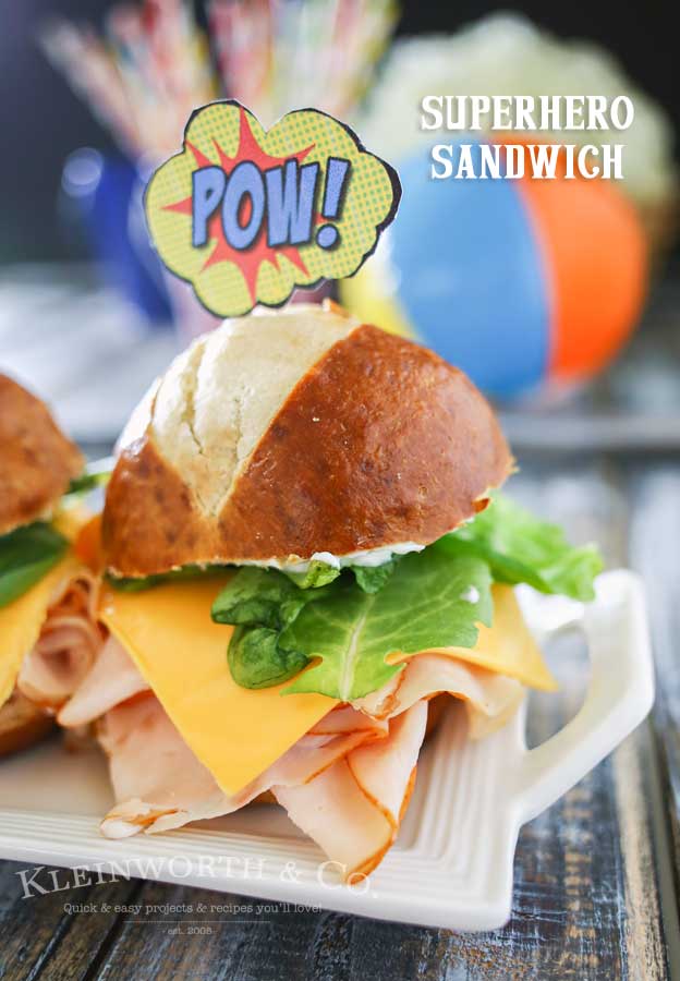 Superhero Sandwich is a fun meal for kids with these FREE printable sandwich toppers & matching temporary tattoos. Make your kid's summer adventurous!
