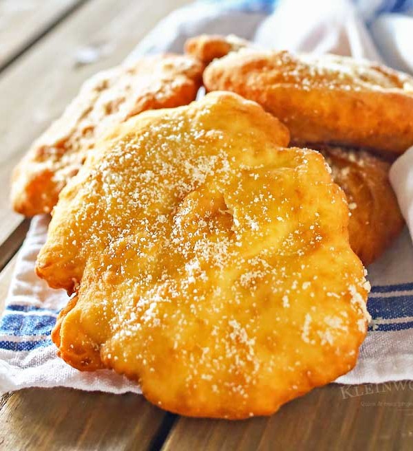 Parmesan Fry Bread is an easy and simple bread dough is quickly fried and sprinkled with parmesan cheese. Delicious addition to so many dinner recipes!