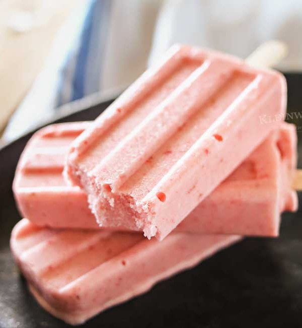 Strawberry Coconut Pops- creamy & yet completely dairy free & contain no refined sugar. They're a tasty, cool & refreshing frozen dessert recipe for summer that's virtually guilt free!